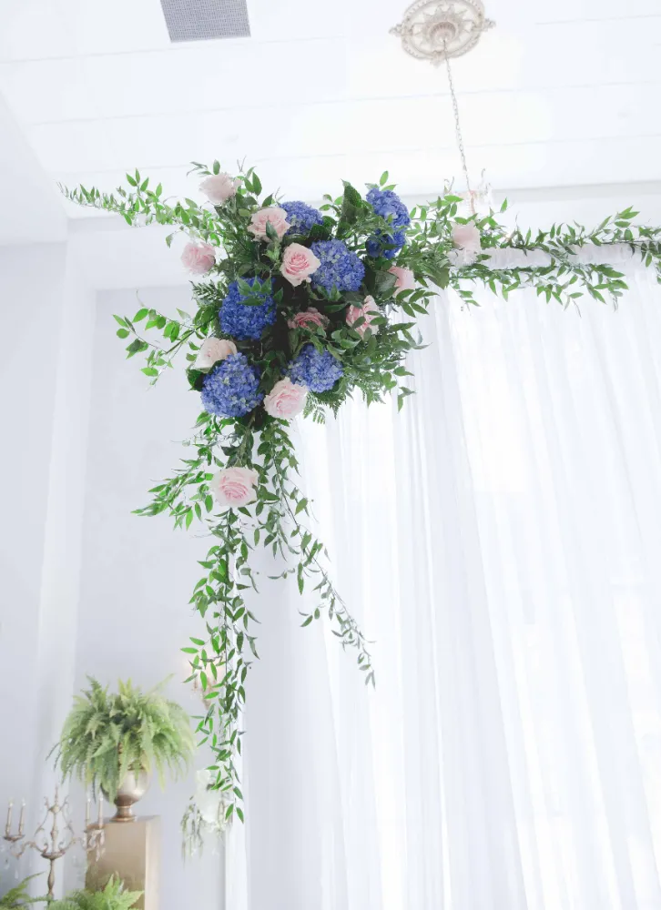 Floral arrangement on wedding arch